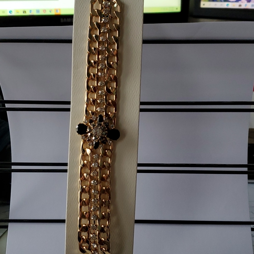 Gold tone choker necklace